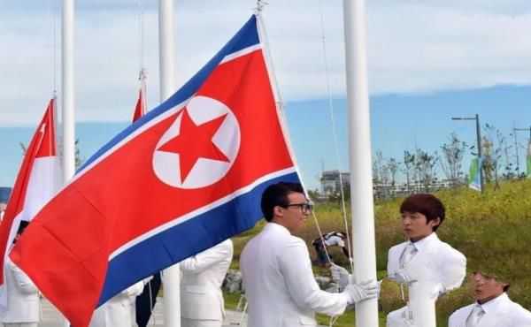 此國沒國旗，用中國國旗代替，我國拒絕，于是在國旗上加8個漢字